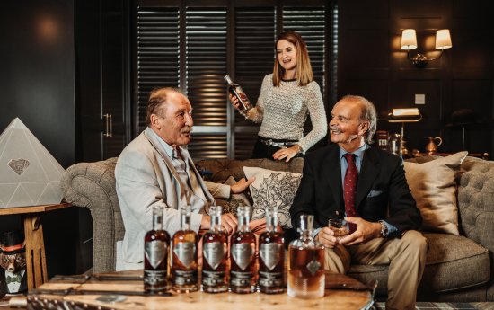 Charles MacLean sampling the XOP 75th Anniversay whiskies with Fred and Cara Laing. Charles MacLean sampling the XOP 75th Anniversay whiskies with Fred and Cara Laing.