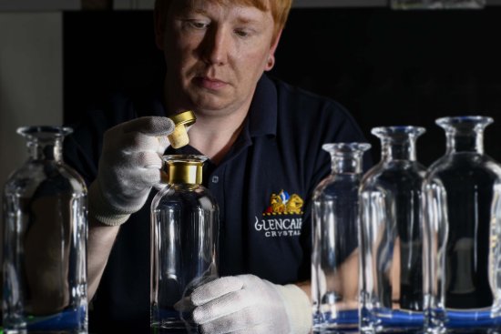 Glencairn Crystal craftsperson.