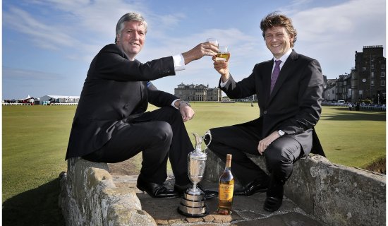 Glenmorangie CEO Marc Hoellinger (right) and Michael Tate, Executive Director – Business Affairs at the R&A at St Andrews, toast Glenmorangie's continuing sponsorship of the Open Championship for the next three years.