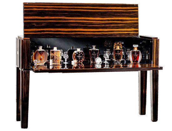 The complete Macallan in Lalique Legacy Collection was housed in a one and only, bespoke natural ebony cabinet created by Lalique Maison. The complete Macallan in Lalique Legacy Collection was housed in a one and only, bespoke natural ebony cabinet created by Lalique Maison.