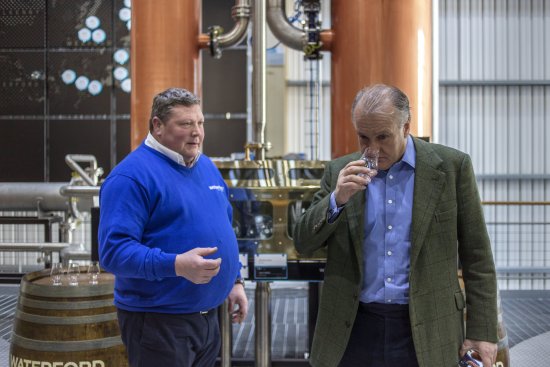 Waterford Distillery Head Distiller Ned Gahan and CEO Mark Reynier sample the biodynamic barley distillation.